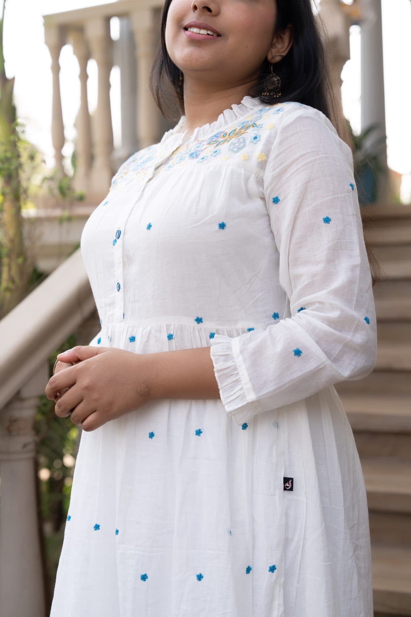 White with Blue Embroidery in White with Blue Embroidery